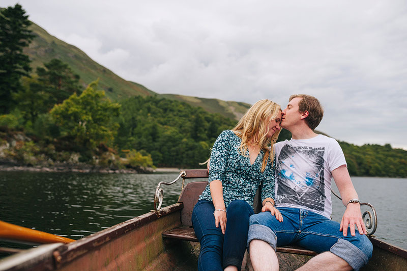 kissing on the back of an old row boat