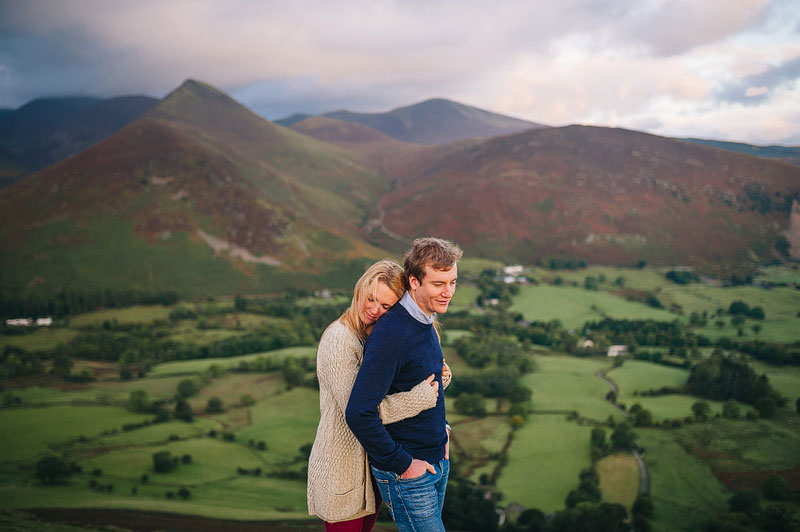 engagement portrait with stunning backdrop of fields and mountains