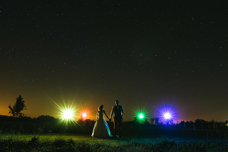 creative night time wedding shot under the stars