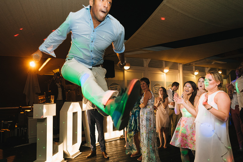 wedding guest jumps off the bands speakers