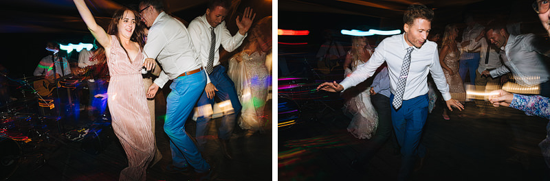 wedding guests partying and dancing at beach bar