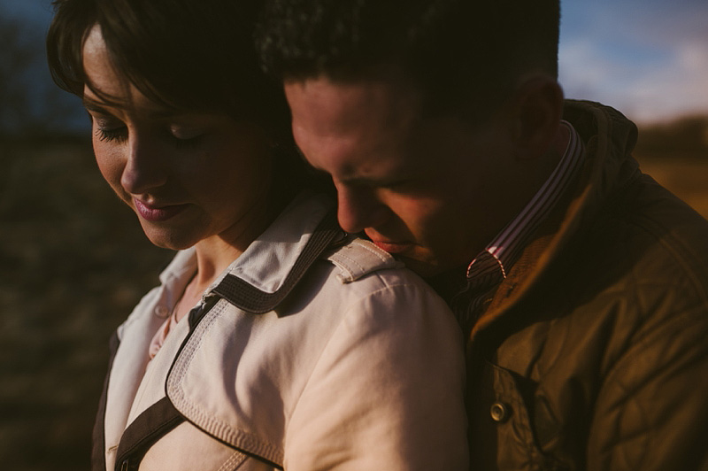 Dramatic light on couples faces