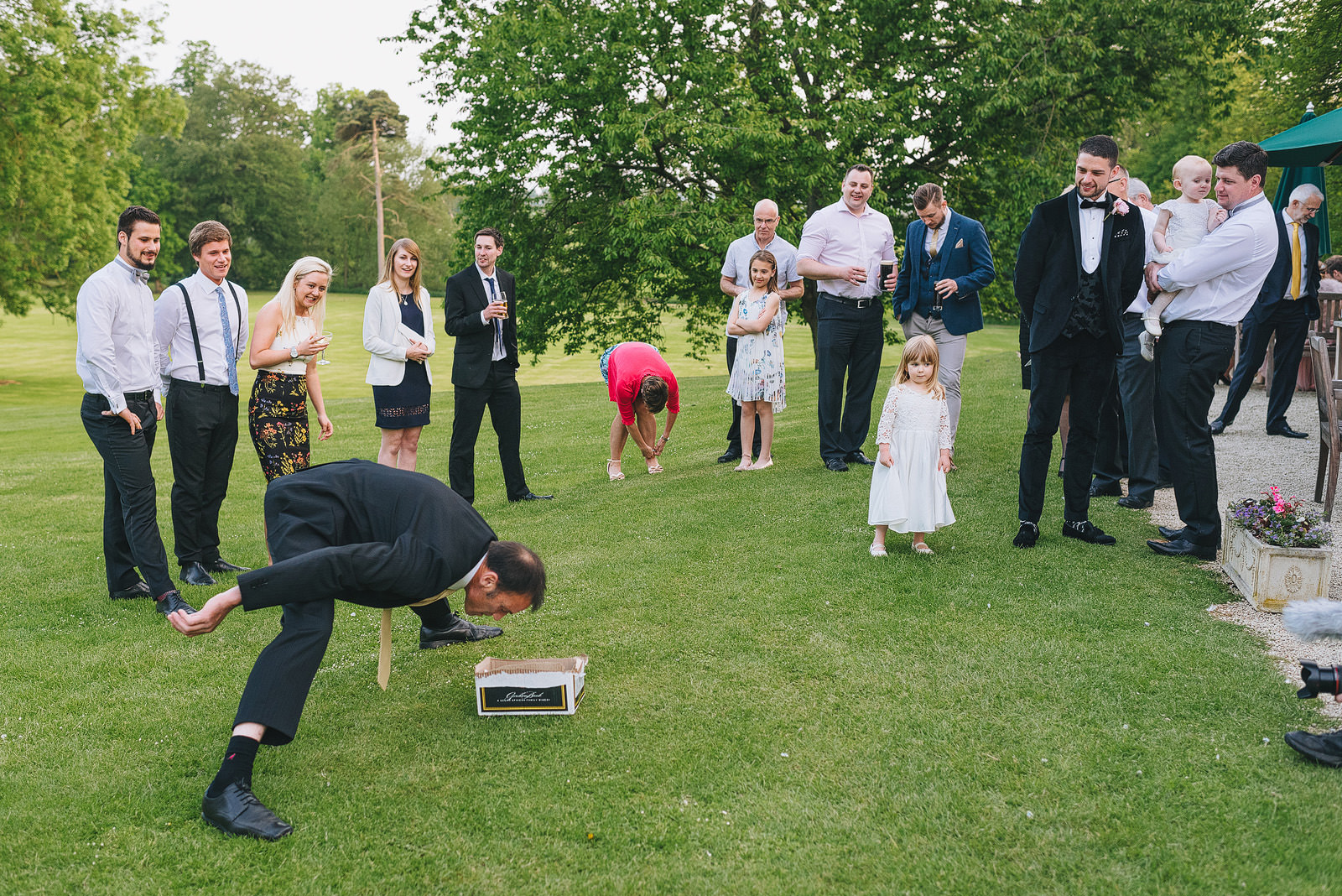 guests play games during wedding reception